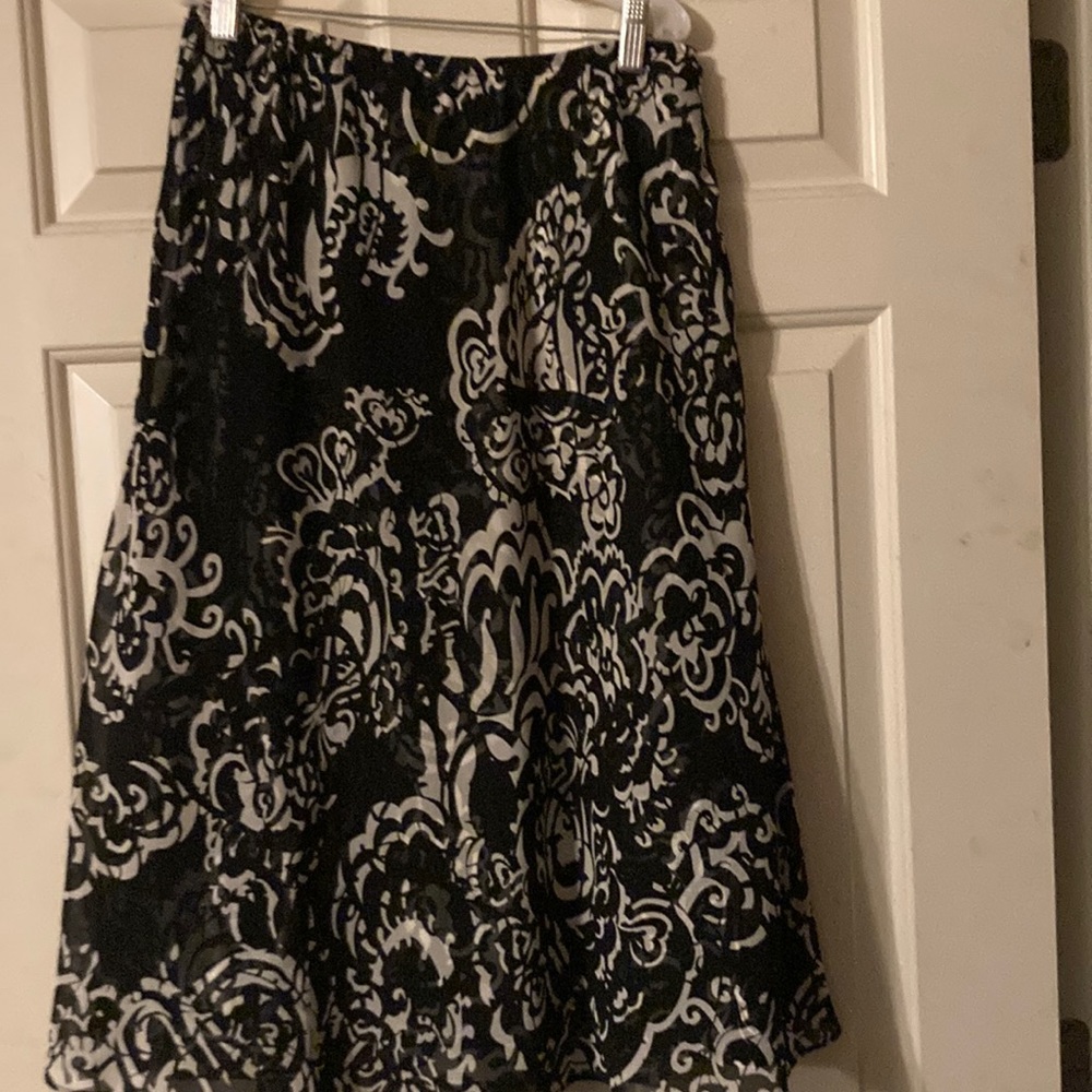 Chico’s (size 1) Black & white patterned skirt with sheer overlay